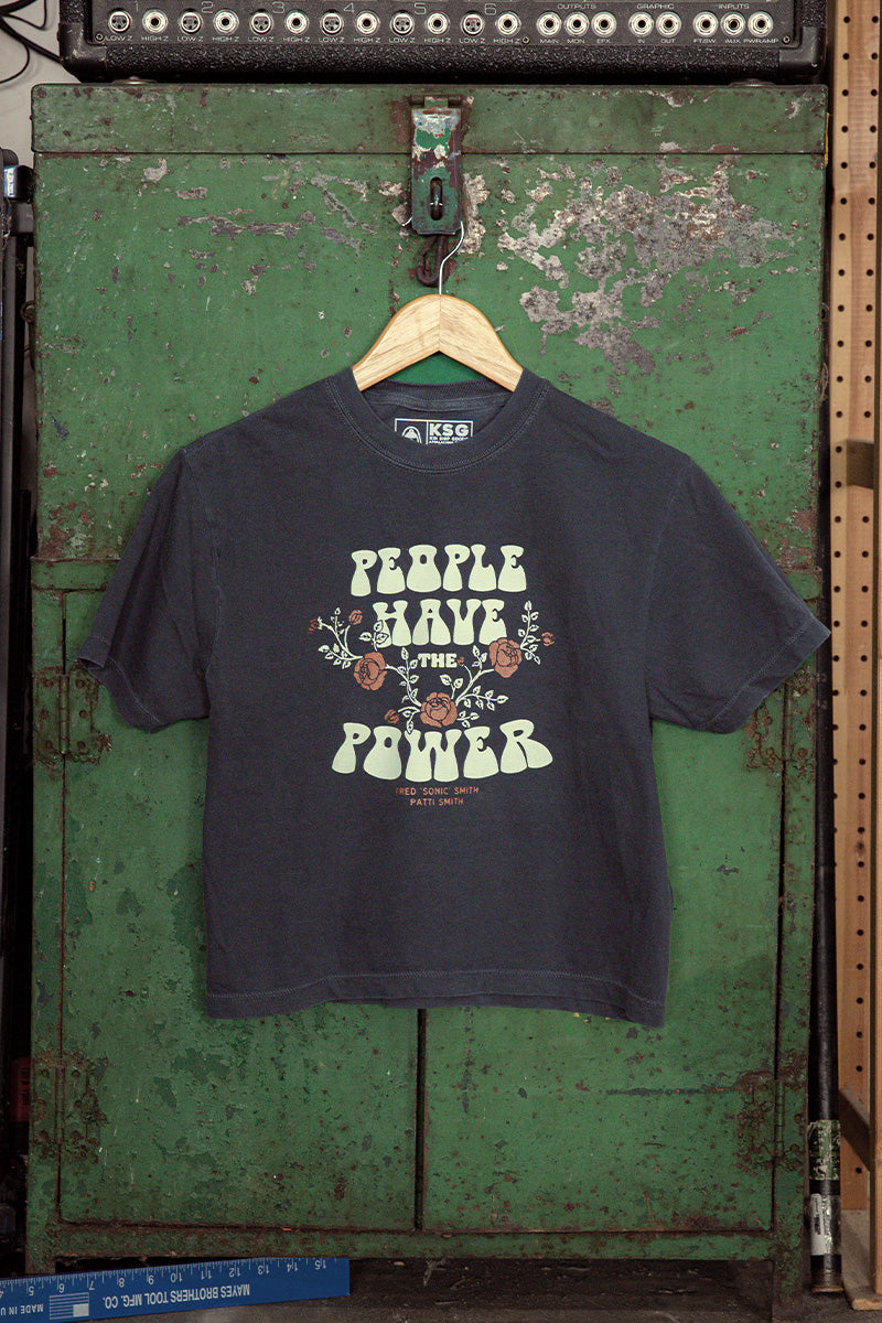 Kin Ship Goods crop tee with floral “People Have the Power” design from official Patti Smith collab, printed on vintage black.

