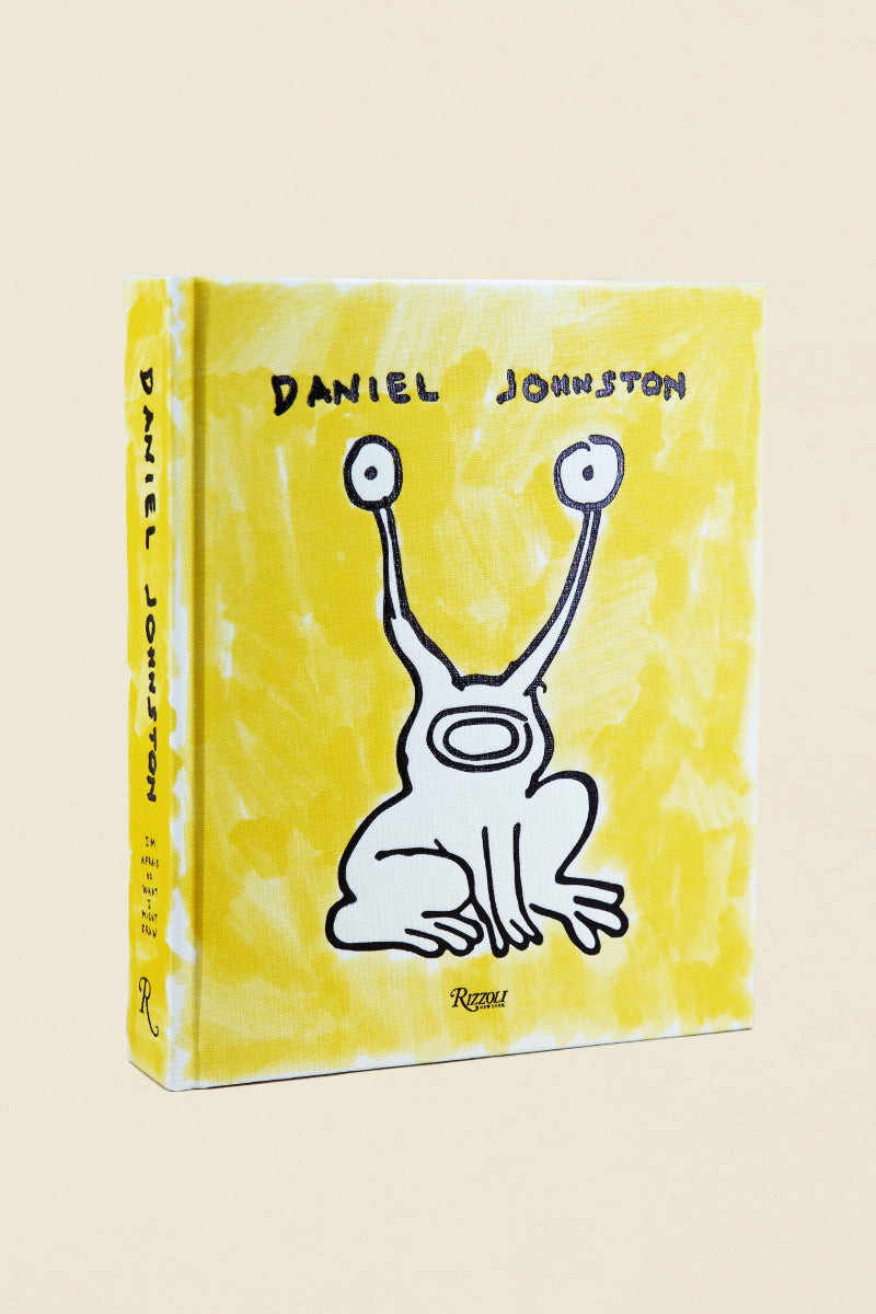 Daniel Johnston hardcover book with drawings, lyrics, and photos—an art-filled tribute to the iconic outsider musician and illustrator


