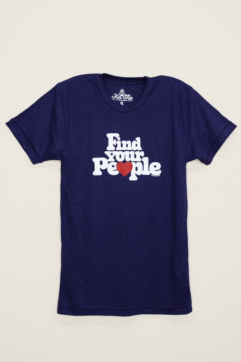 Kin Ship Goods navy tee with bold white ‘Find Your People’ text and red heart graphic, celebrating friendship and community.
