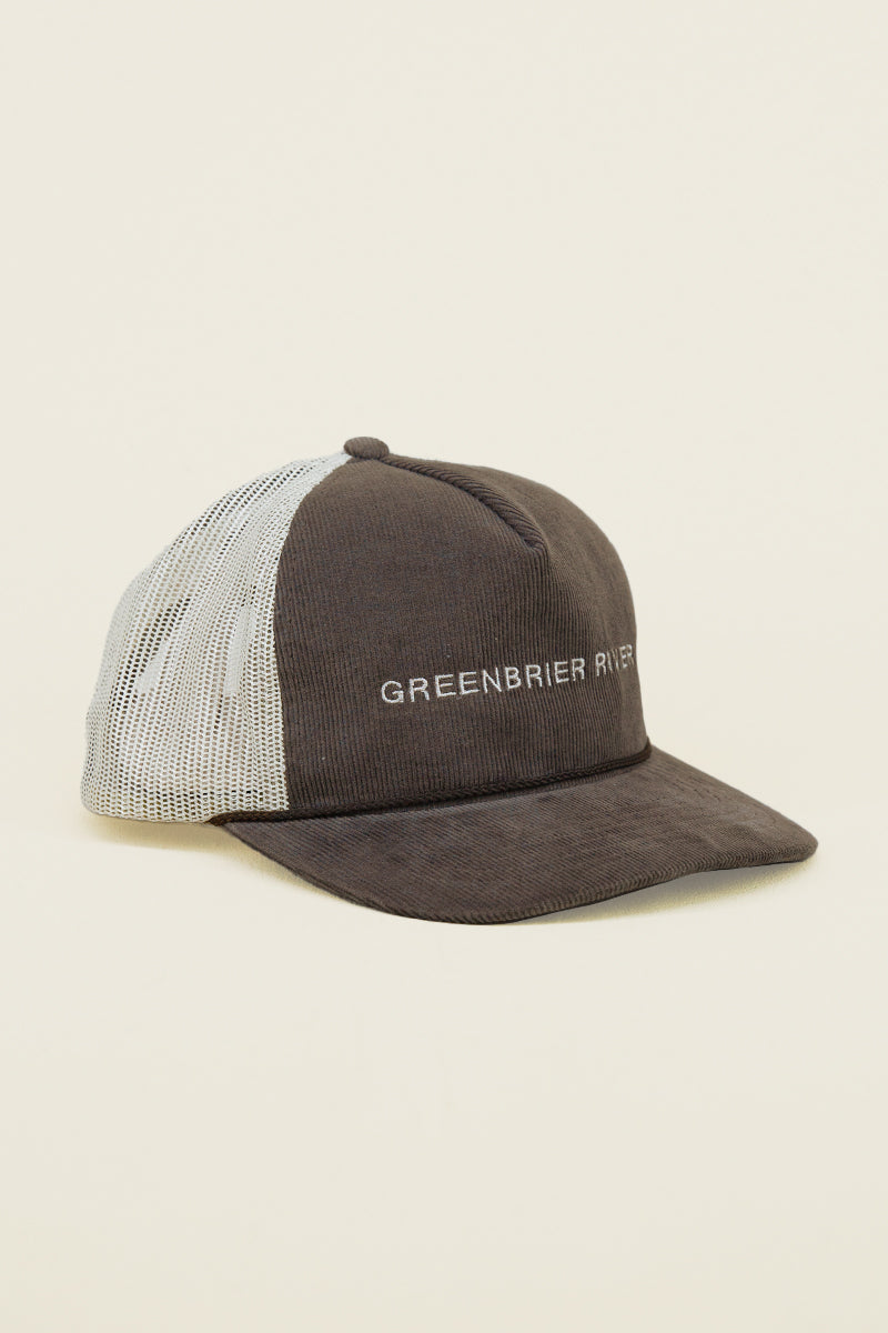 Brown and white Kin Ship Goods trucker hat with corduroy front and ‘Greenbrier River’ embroidery, angled on neutral background.