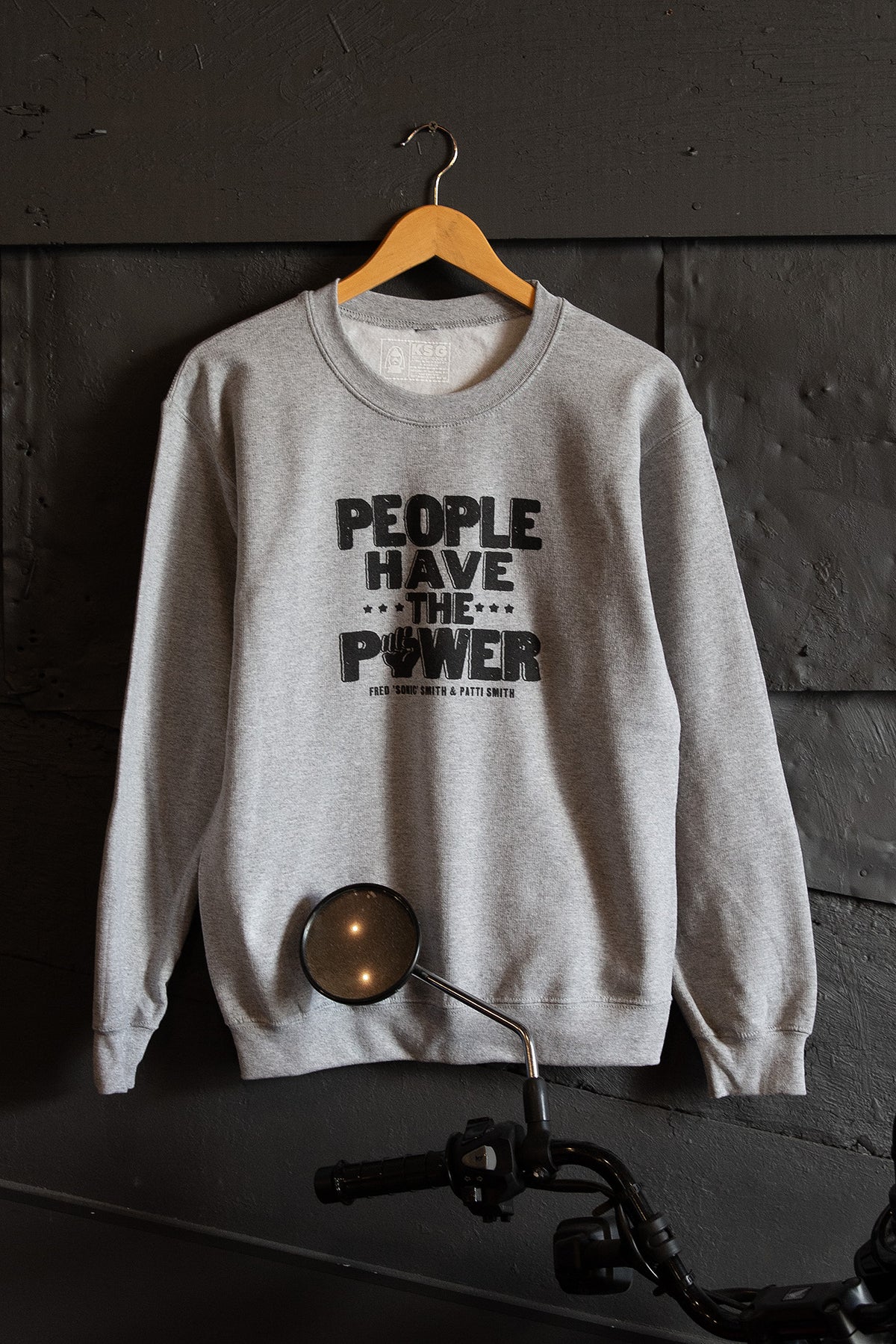 Kin Ship Goods heather grey sweatshirt with bold “People Have the Power” lyric design from our collab with Patti Smith.