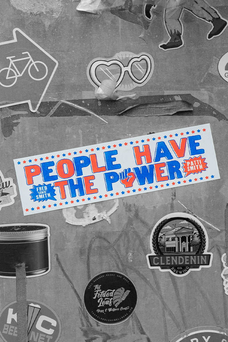 Kin Ship Goods x Patti Smith 'People Have the Power' bumper sticker with bold red, white, and blue lyric design.