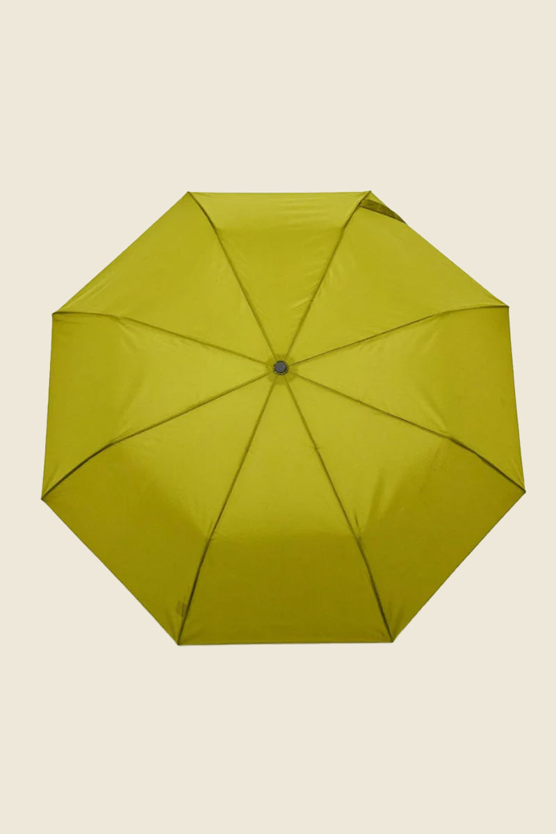 Kin Ship Goods olive green umbrella with carved wooden duck handle—compact, stylish umbrella with personality for rainy day protection.