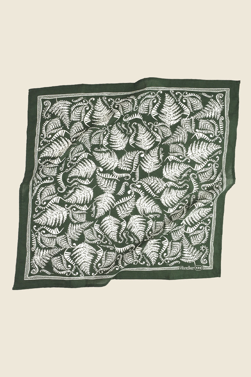 Kin Ship Goods fern bandana with white botanical print on dark green cotton-poly fabric for earthy, forest-inspired style