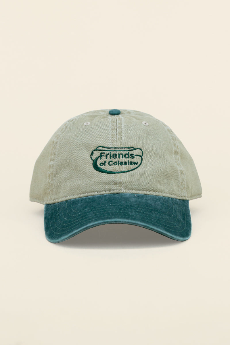 Kin Ship Goods Friends of Coleslaw dad hat with green embroidered logo—khaki and forest green cotton cap with Appalachian flair.
