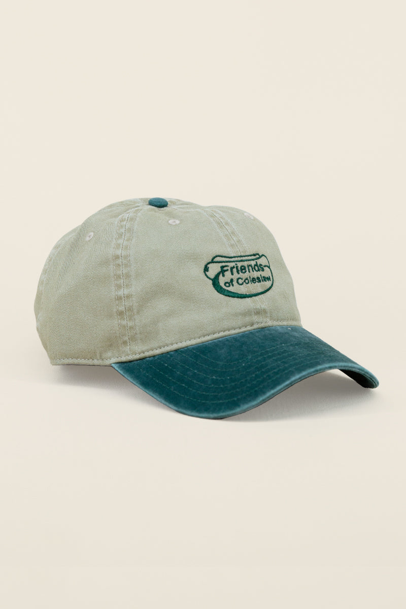 Kin Ship Goods Friends of Coleslaw dad hat with green embroidered logo—khaki and forest green cotton cap with Appalachian flair.