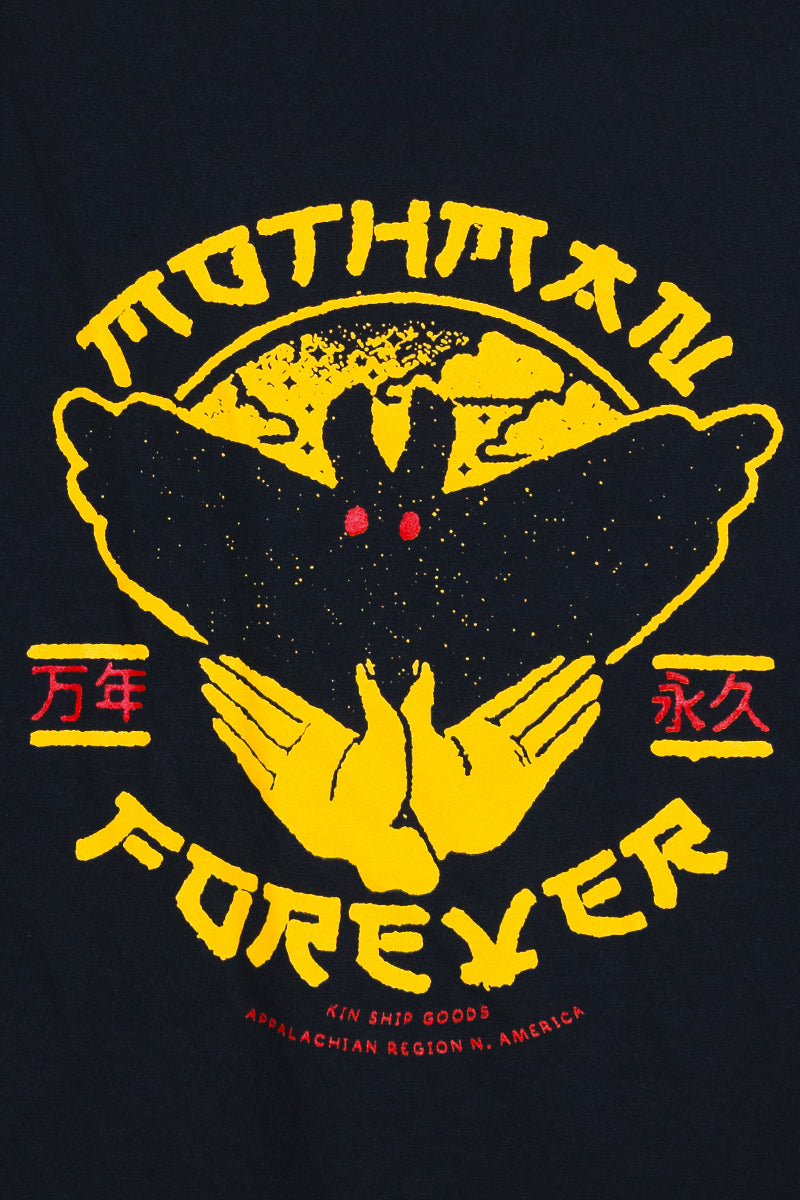 Kin Ship Goods Mothman Forever t-shirt with bold yellow chest graphic and red-eyed cryptid on black cotton tee.