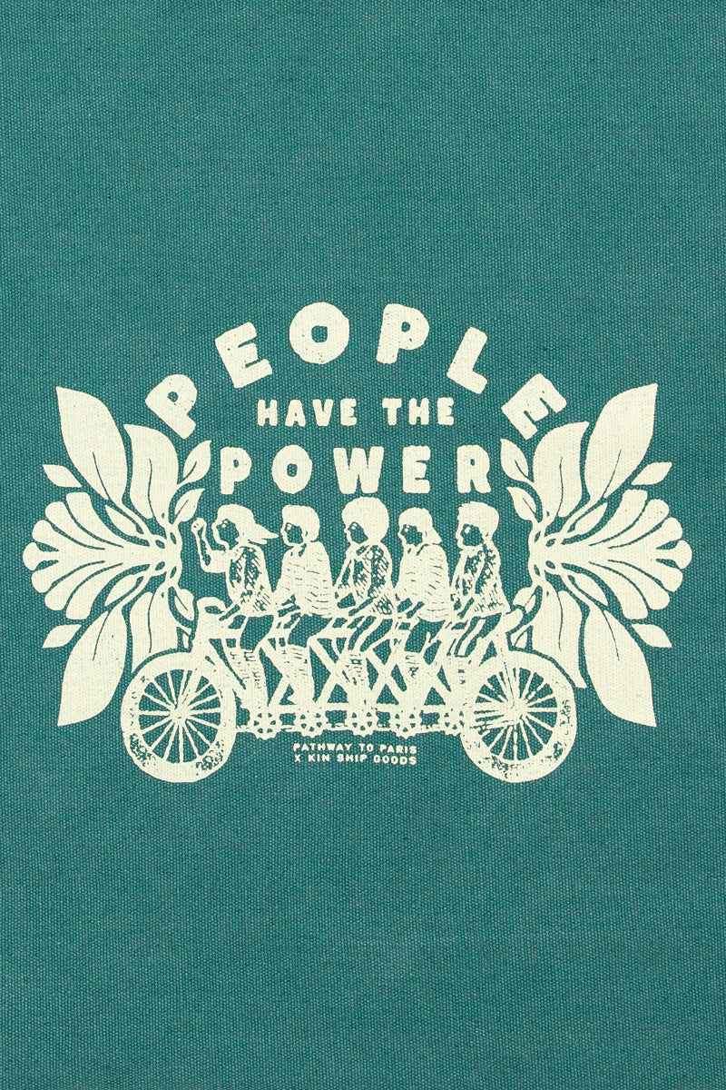 close up people have the power pathway to paris kin ship goods green tote