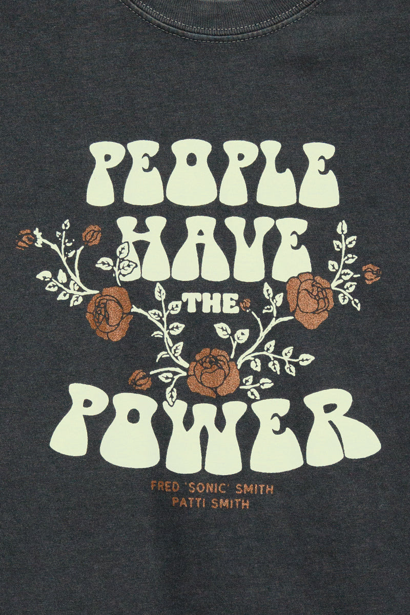 Kin Ship Goods crop tee with floral “People Have the Power” design from official Patti Smith collab, printed on vintage black.


