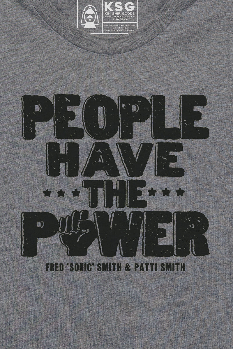 Kin Ship Goods gray kids tee with “People Have the Power” design from official Patti Smith collab, inspired by her iconic lyrics.
