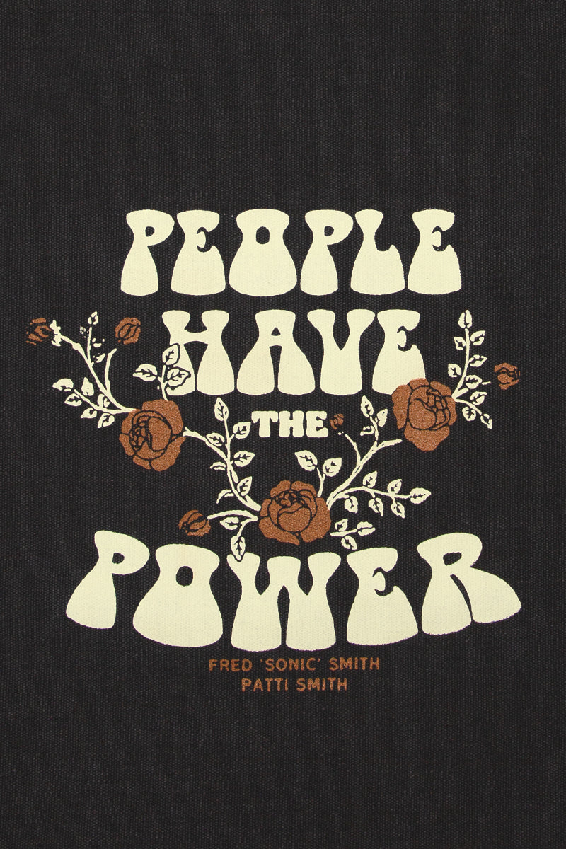 Kin Ship Goods black tote with floral “People Have the Power” design from official Patti Smith collaboration.

