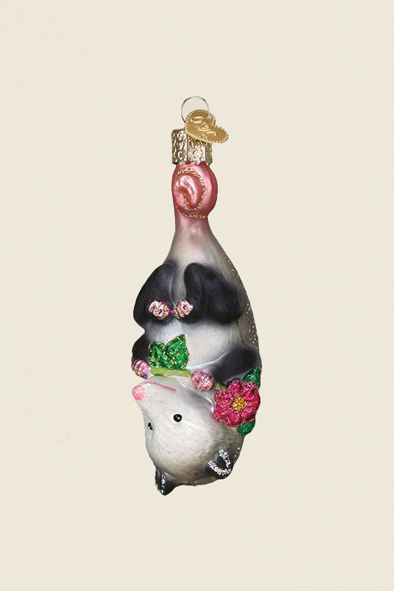 Glittery possum Christmas ornament with floral details from Kin Ship Goods – a whimsical woodland holiday decoration.