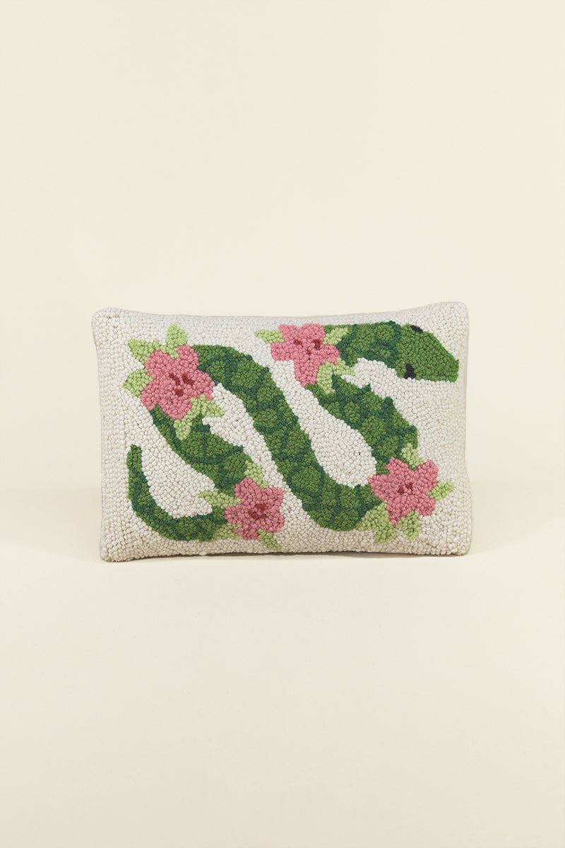 Kin Ship Goods floral snake hook pillow with green leafy serpent and pink flowers on cream—bold botanical home décor with cozy texture.