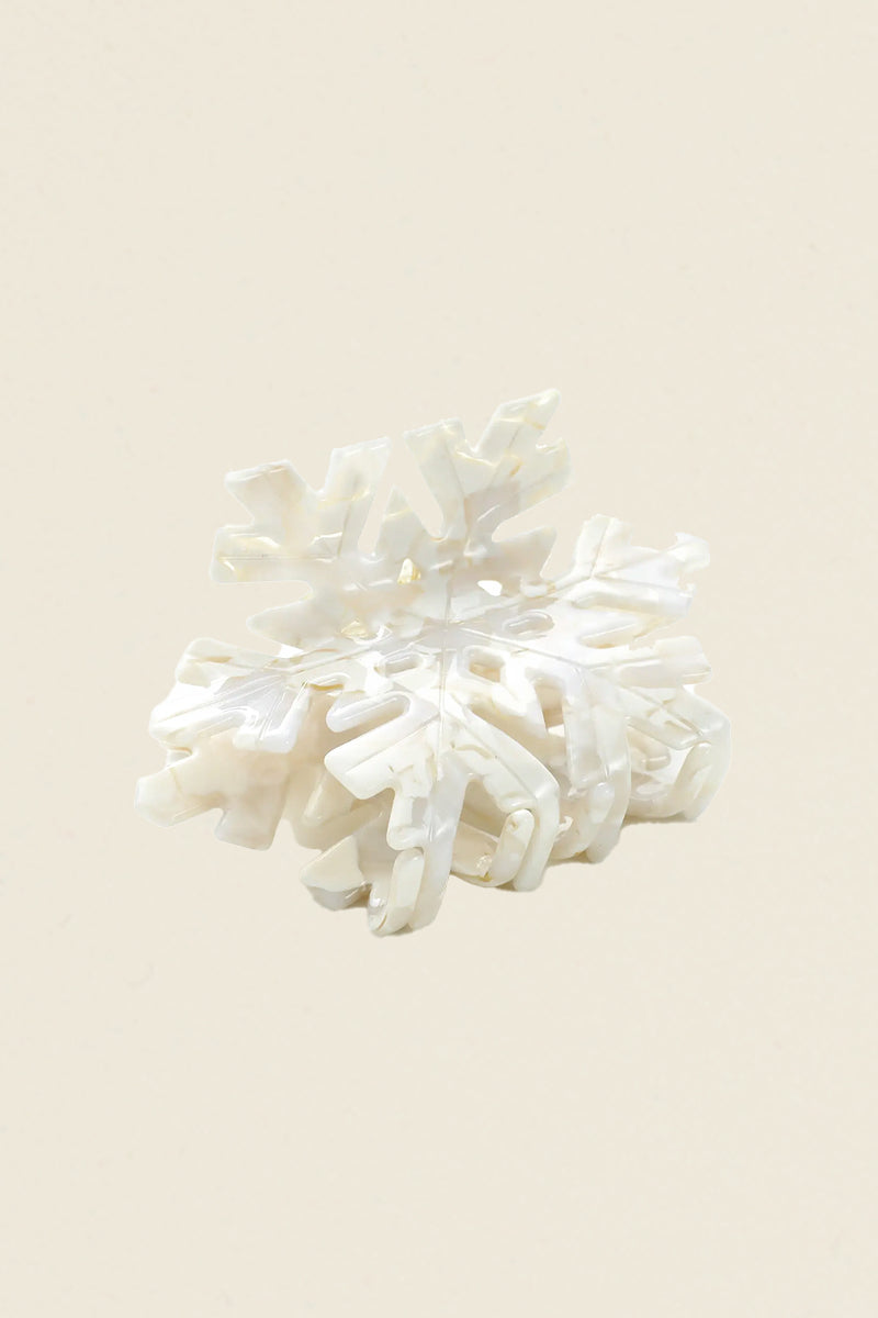 Kin Ship Goods snowflake claw hair clip in pearly white acetate with iridescent shine, festive winter accessory
