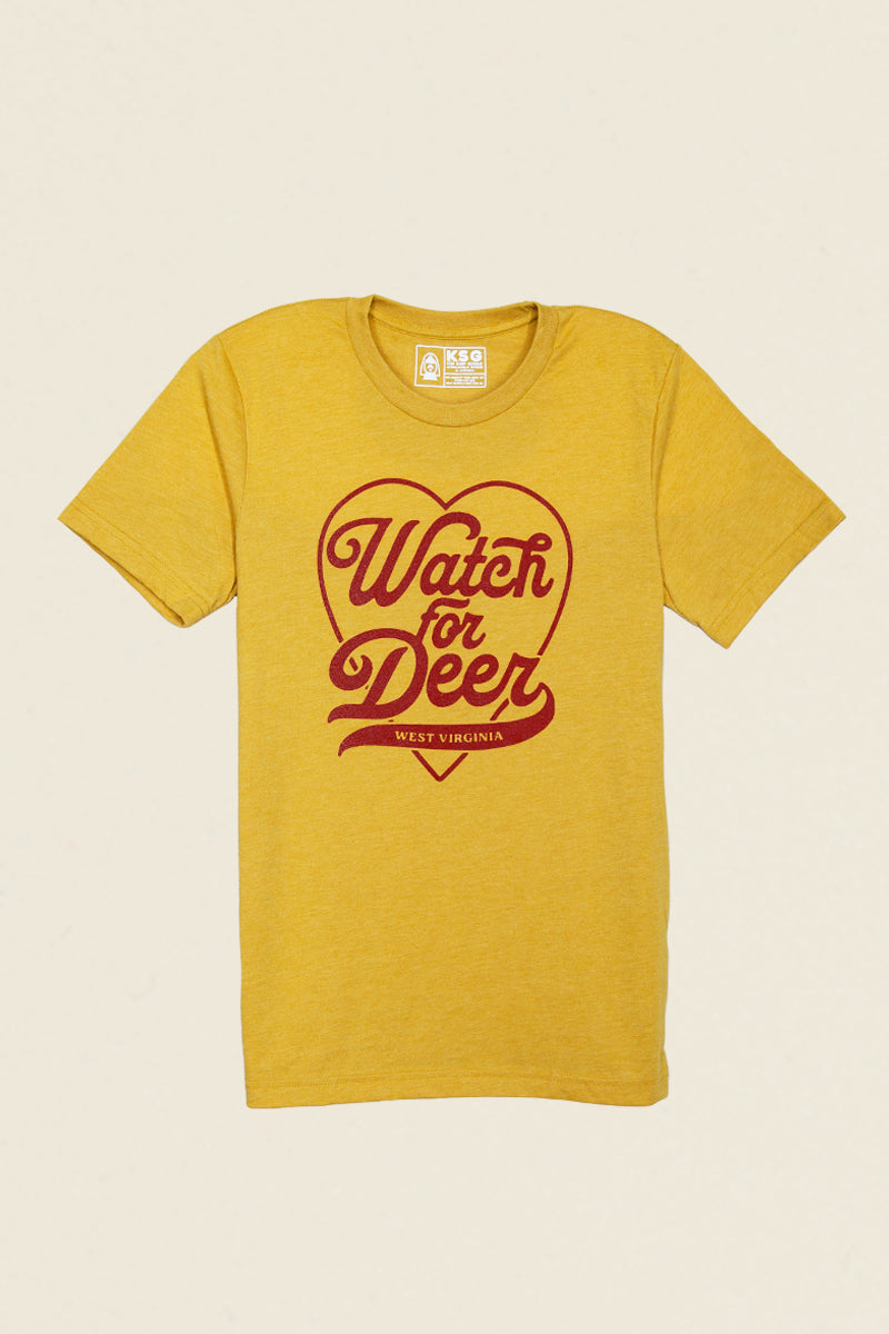 Kin Ship Goods gold t-shirt with maroon 'Watch for Deer' text inside a heart shape, featuring West Virginia at the base.